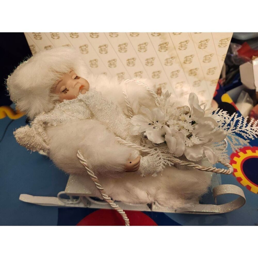 "WINTER BABY" IN SLEIGH FROM HERITAGE SIGNATURE COLLECTION